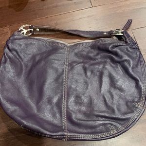 Lucky brand purple bag with metal peace signs on strap